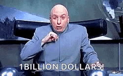 A Bald Man Is Sitting In A Chair And Pointing At The Camera While Saying `` 1 Billion Dollars '' . GIF