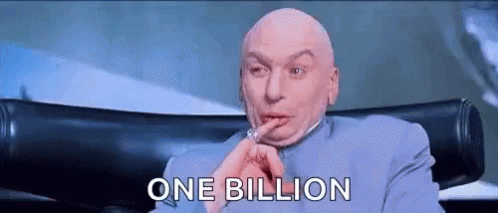 A Bald Man Is Sitting In A Chair With His Finger In His Mouth And The Words `` One Billion '' Above Him . GIF