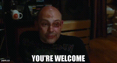 A Bald Man Is Smiling With The Words `` You 'Re Welcome '' Written Below Him . GIF