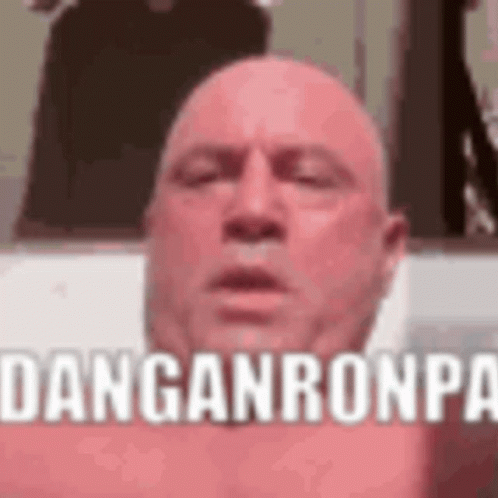A Bald Man Is Taking A Selfie With His Eyes Closed And The Words `` Danganronpa '' Written On His Face . GIF