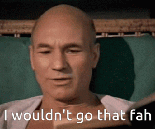 A Bald Man Reading A Book With The Words " I Wouldn 'T Go That Fah " On The Bottom GIF