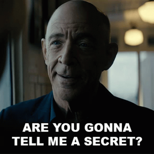 A Bald Man Says " Are You Gonna Tell Me A Secret ? " GIF