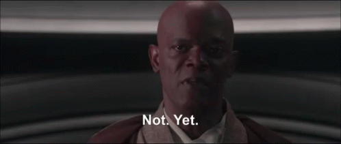 A Bald Man Says Not Yet In A Dark Room GIF