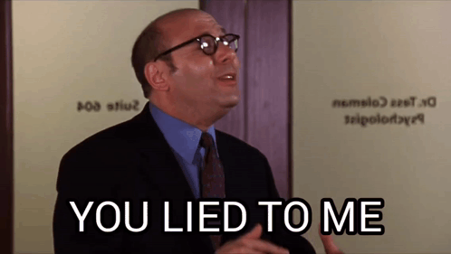 A Bald Man Wearing Glasses And A Suit Says You Lied To Me GIF