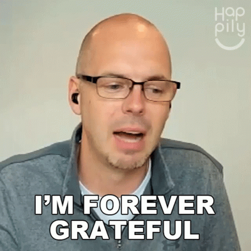 A Bald Man Wearing Glasses Is Saying I 'M Forever Grateful GIF