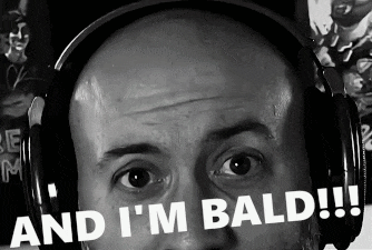 a bald man wearing headphones says " and i 'm bald !!! "
