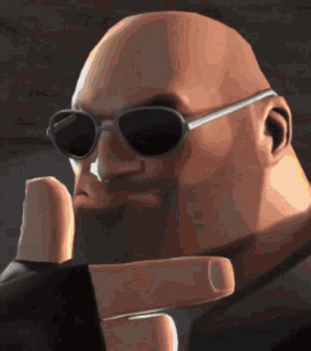 A Bald Man Wearing Sunglasses And A Black Jacket Is Making A Peace Sign . GIF