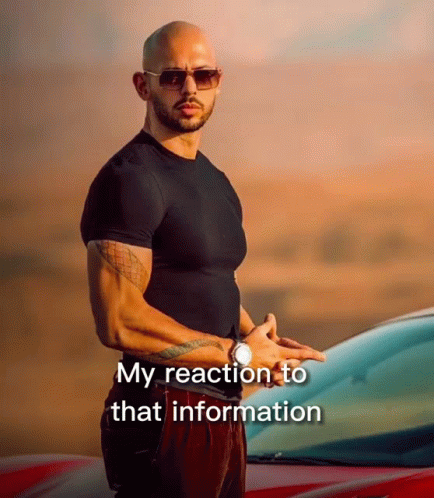 A Bald Man Wearing Sunglasses And A Black Shirt Stands In Front Of A Car With The Words " My Reaction To That Informatio GIF