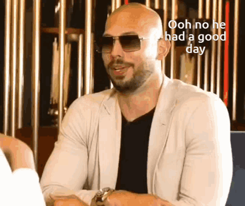 A Bald Man Wearing Sunglasses Says Ooh No He Had A Good Day . GIF