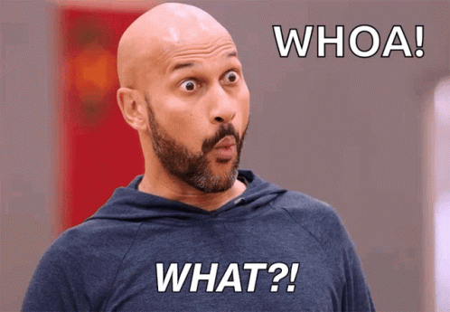 A Bald Man With A Beard Is Wearing A Blue Shirt That Says " What " GIF