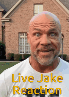 A Bald Man With A Beard Is Wearing A White Shirt That Says Live Jake Reaction On It GIF
