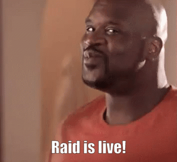 A Bald Man With A Beard Wearing A Red Shirt Is Saying Raid Is Live . GIF