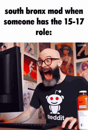 A Bald Man With A Beard Wearing A Reddit Shirt Looks At A Computer Screen GIF
