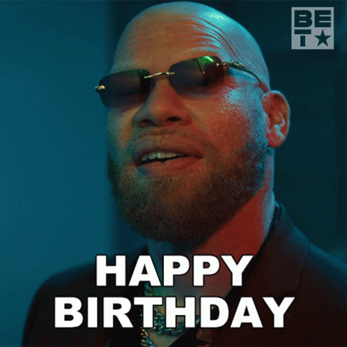 A Bald Man With A Beard Wearing Sunglasses Says " Happy Birthday " GIF
