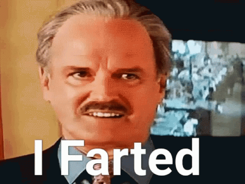 A Bald Man With A Mustache And The Words I Farted Behind Him GIF