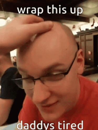A Bald Man With Glasses Is Being Touched By Someone With The Caption " Wrap This Up Daddy 'S Tired " GIF