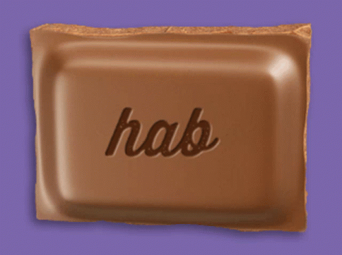 A Bar Of Chocolate Has The Word Hab Written On It GIF