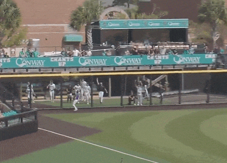A Baseball Field With A Banner That Says " Conway " On It GIF
