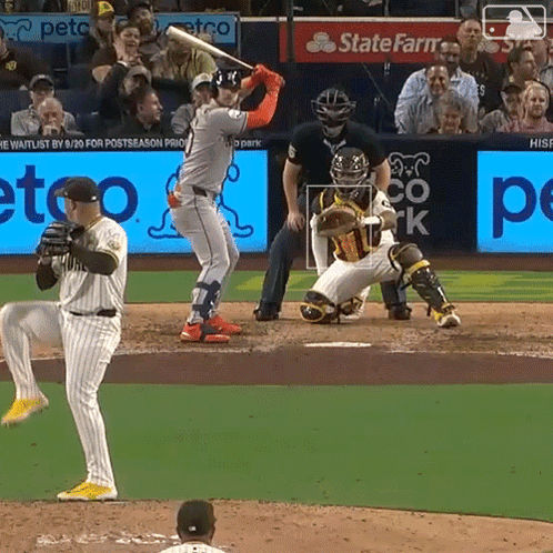 A Baseball Game Being Played In Front Of A State Farm Ad GIF
