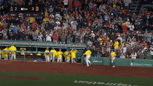 A Baseball Game Between The Angels And The Red Sox With A Score Of 3 To 2 GIF