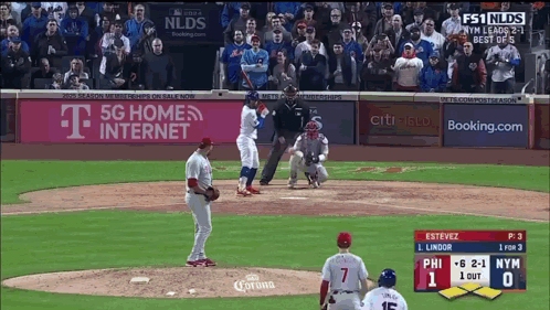 A Baseball Game Between The Phillies And The Mets Is Being Played GIF