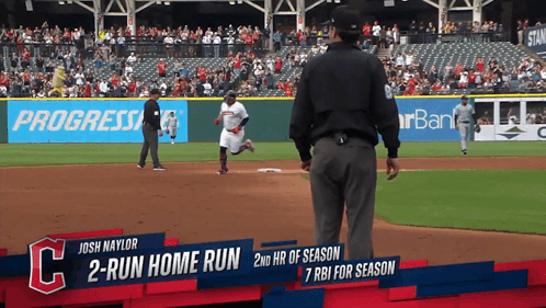 A Baseball Game Is Being Played And A Player Named Josh Naylor Is Running To First Base GIF