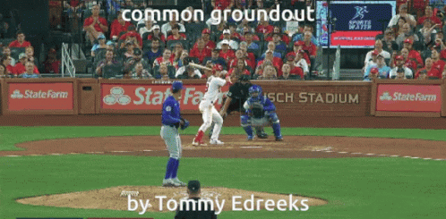 A Baseball Game Is Being Played At Busch Stadium And The Player At Bat Is Named Tommy Edreeks GIF