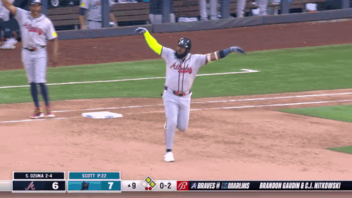 A Baseball Game Is Being Played Between Atlanta Braves And The Marlins GIF