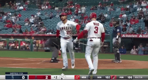 A Baseball Game Is Being Played Between The Angels And The Rangers GIF