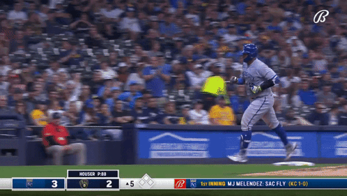 A Baseball Game Is Being Played Between The Brewers And The Royals GIF