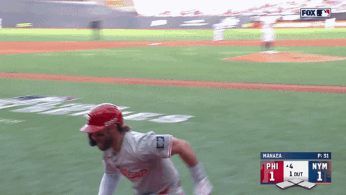 a baseball game is being played between the phillies and the yankees