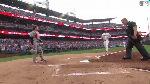 a baseball game is being played in a stadium that says home run on it