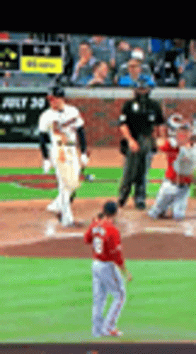 A Baseball Game Is Being Played In A Stadium With A Sign That Says Just 30 On It GIF