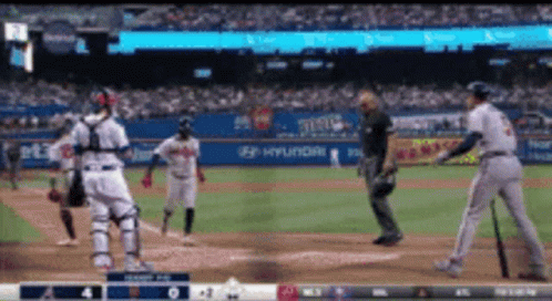 A Baseball Game Is Being Played In A Stadium With Hyundai Advertisements On The Wall GIF