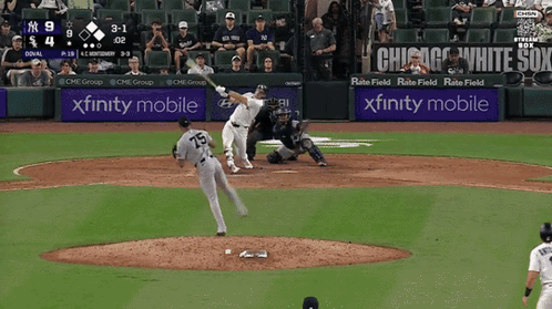 A Baseball Game Is Being Played In A Stadium With Xfinity Mobile Advertisements GIF
