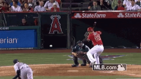 A Baseball Game Is Being Played In Front Of A Banner For State Farm GIF