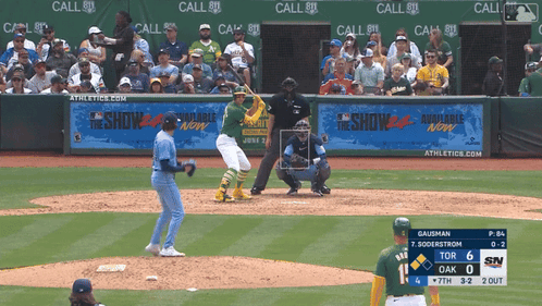 A Baseball Game Is Being Played In Front Of A Banner That Says The Show Available Now GIF