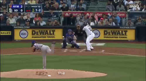 a baseball game is being played in front of a dewalt advertisement