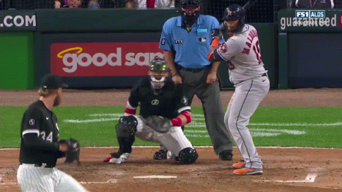 A Baseball Game Is Being Played In Front Of A Good Sam Sign GIF