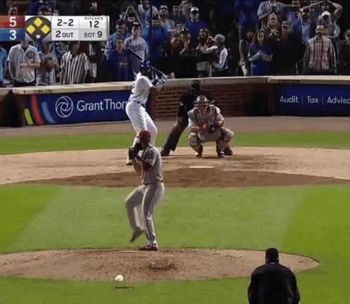 A Baseball Game Is Being Played In Front Of A Grant Thor Banner GIF
