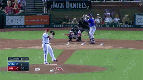 A Baseball Game Is Being Played In Front Of A Jack Daniels Sign GIF