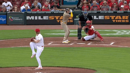 A Baseball Game Is Being Played In Front Of A Milestar Tires Advertisement GIF