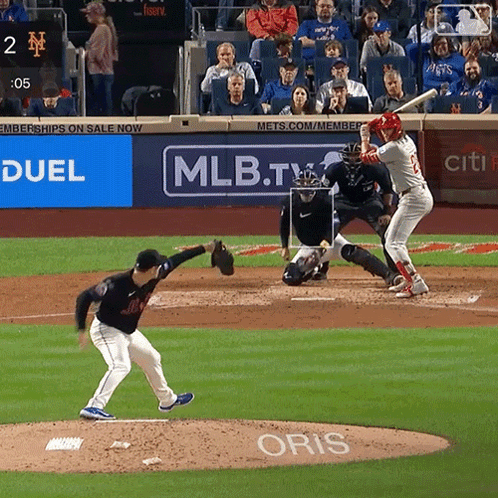 A Baseball Game Is Being Played In Front Of A Mlb.tv Ad GIF