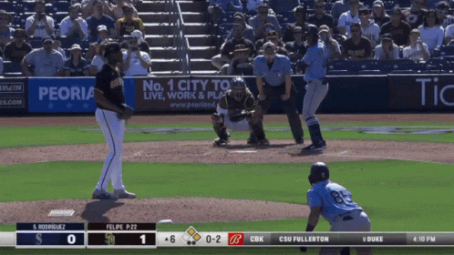 A Baseball Game Is Being Played In Front Of A Peoria Sign GIF