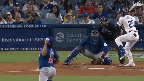 A Baseball Game Is Being Played In Front Of A Security Benefit Advertisement GIF