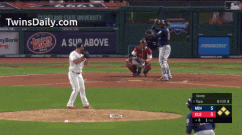 A Baseball Game Is Being Played In Front Of A Sign That Says A Sup Above GIF