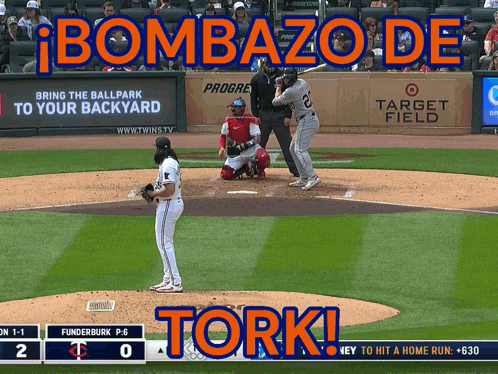 A Baseball Game Is Being Played In Front Of A Target Field Sign GIF