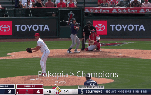 A Baseball Game Is Being Played In Front Of A Toyota Banner GIF