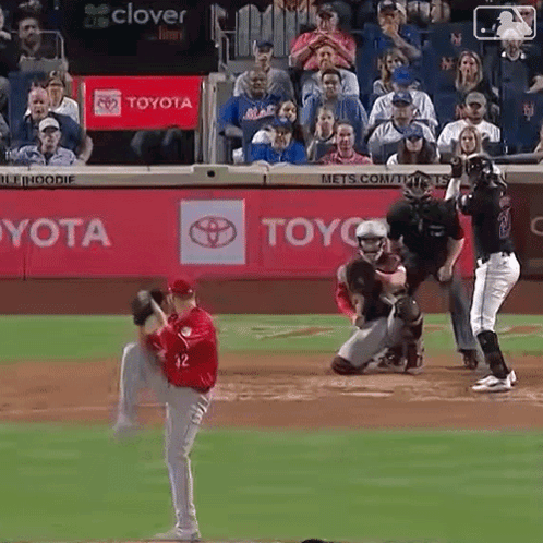 A Baseball Game Is Being Played In Front Of A Toyota Banner GIF