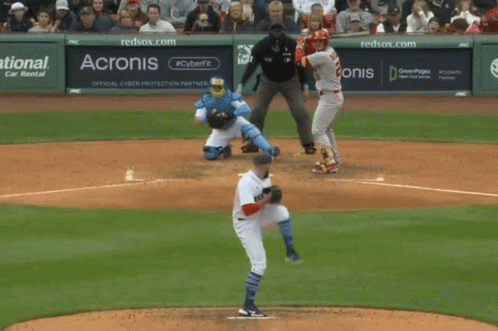A Baseball Game Is Being Played In Front Of An Acronis Banner GIF